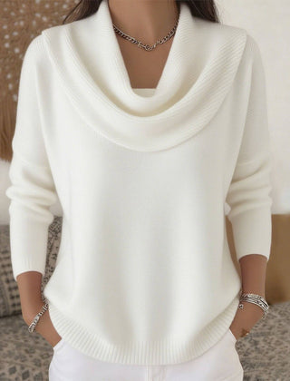 Women’s cowl neck sweater by THE WHITMORE FAMILY, cozy knit jumper with a relaxed fit and stylish drape, shown in a neutral color.