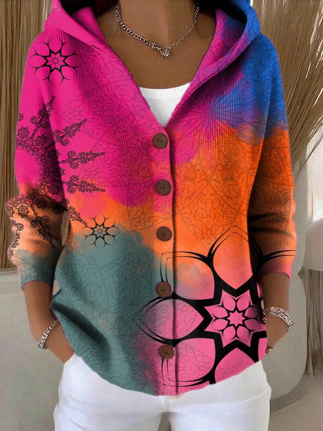 Women’s patchwork hooded vest by THE WHITMORE FAMILY, featuring colorful quilted design and cozy collar detail.