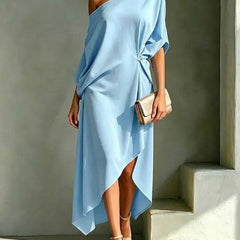 Elegant Calla asymmetric dress by THE WHITMORE FAMILY, featuring sleek design and sophisticated style, shown in the image.