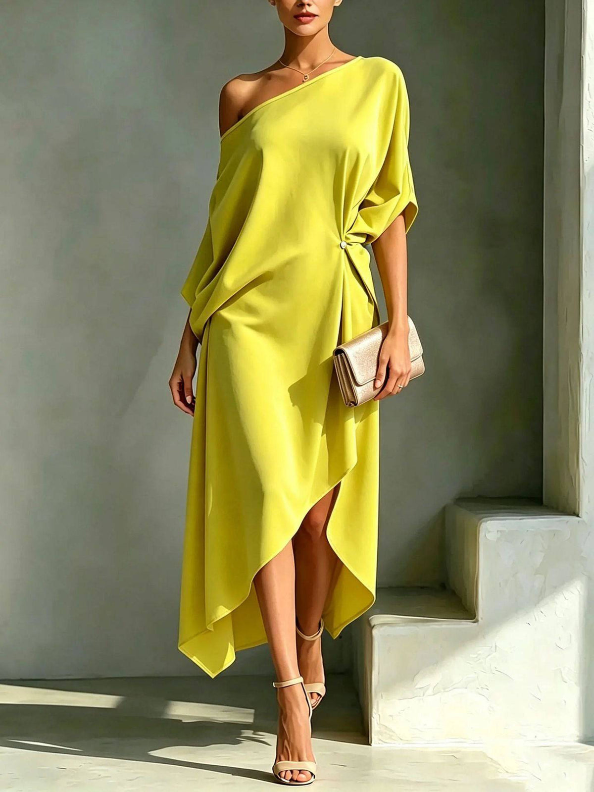 Elegant Calla asymmetric dress by THE WHITMORE FAMILY, featuring a stylish silhouette and sophisticated design.