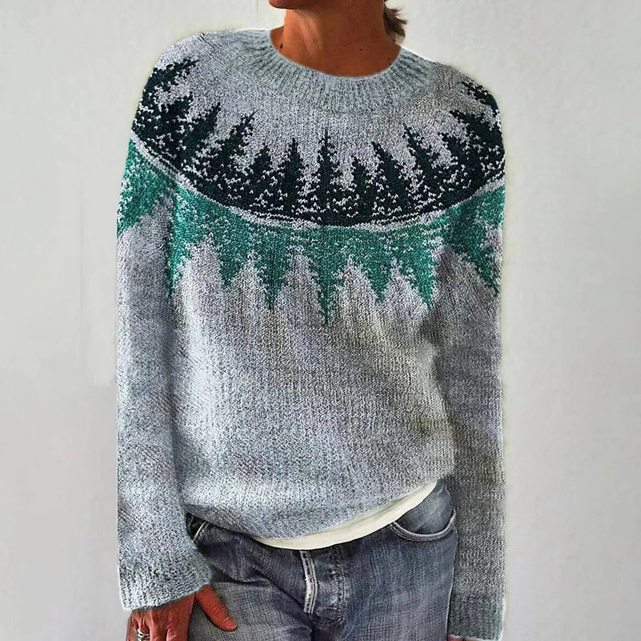 Ellie retro Scandinavian knitted sweater by THE WHITMORE FAMILY featuring colorful geometric patterns and cozy wool material.