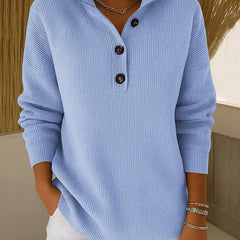 Phoebe Blue V-neck polo jumper sweater for women by THE WHITMORE FAMILY, featuring a classic V-neck design and soft knit fabric.