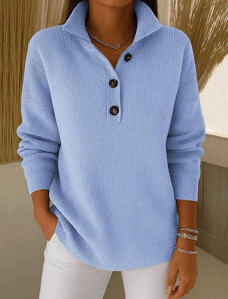 Phoebe Blue V-neck polo jumper sweater for women by THE WHITMORE FAMILY, featuring a classic V-neck design and soft knit fabric.