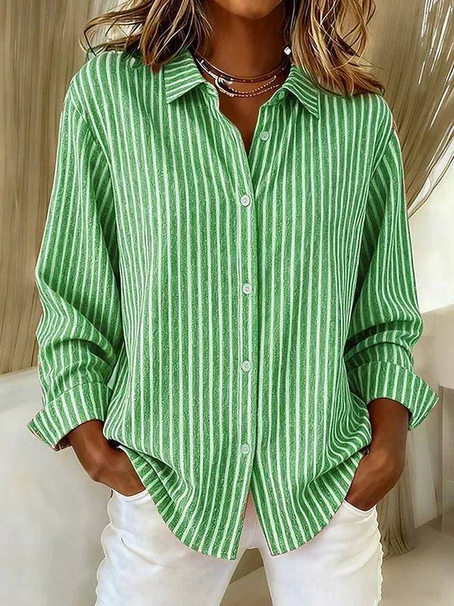 Rebecca wearing the Jacqueline striped button-down shirt by THE WHITMORE FAMILY, featuring classic horizontal stripes and a collar.