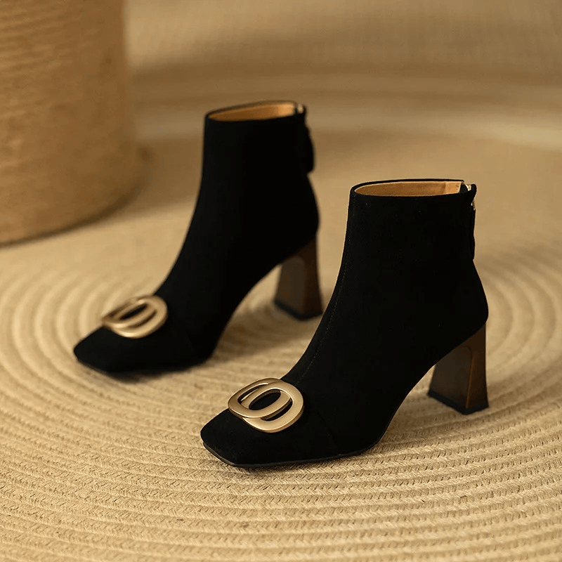 Opium Velvet Boots by THE WHITMORE FAMILY featuring plush velvet texture and stylish ankle-high design.