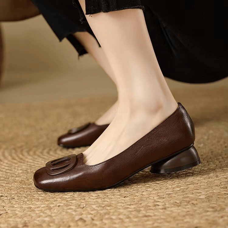 Opium leather flats by THE WHITMORE FAMILY featuring sleek design and pointed toes, perfect for stylish everyday wear.