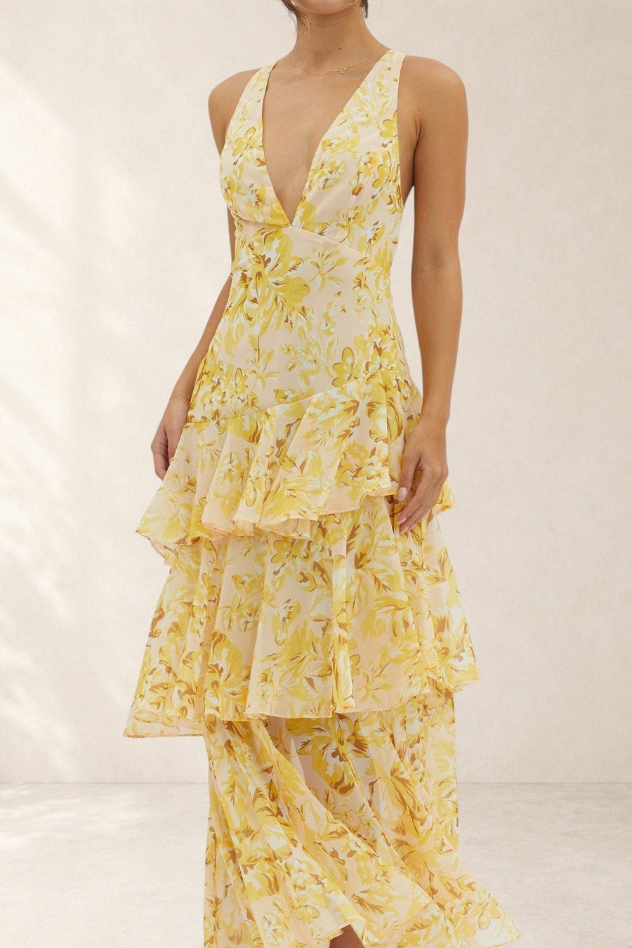 Yellow Taviana™ midi dress by THE WHITMORE FAMILY, featuring a sophisticated design with a fitted bodice and flowing skirt.