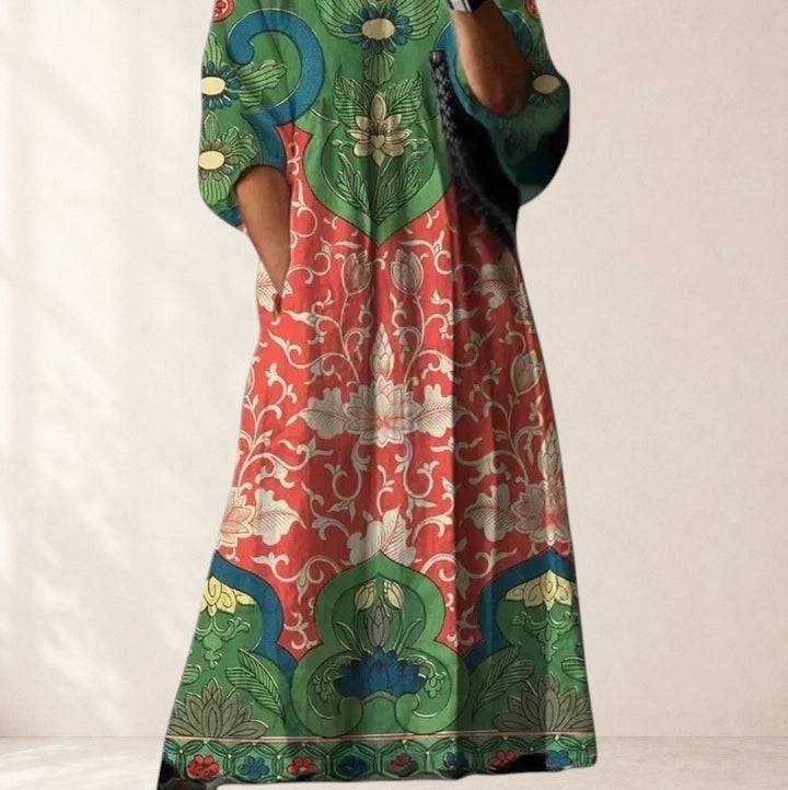 Elegant Kymberah midi dress by THE WHITMORE FAMILY displayed on a hanger, showcasing its sophisticated design and fabric details.