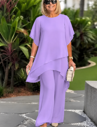 Elegant Beverly™ asymmetrical two-piece set by THE WHITMORE FAMILY featuring stylish, modern design with a coordinated top and bottom.