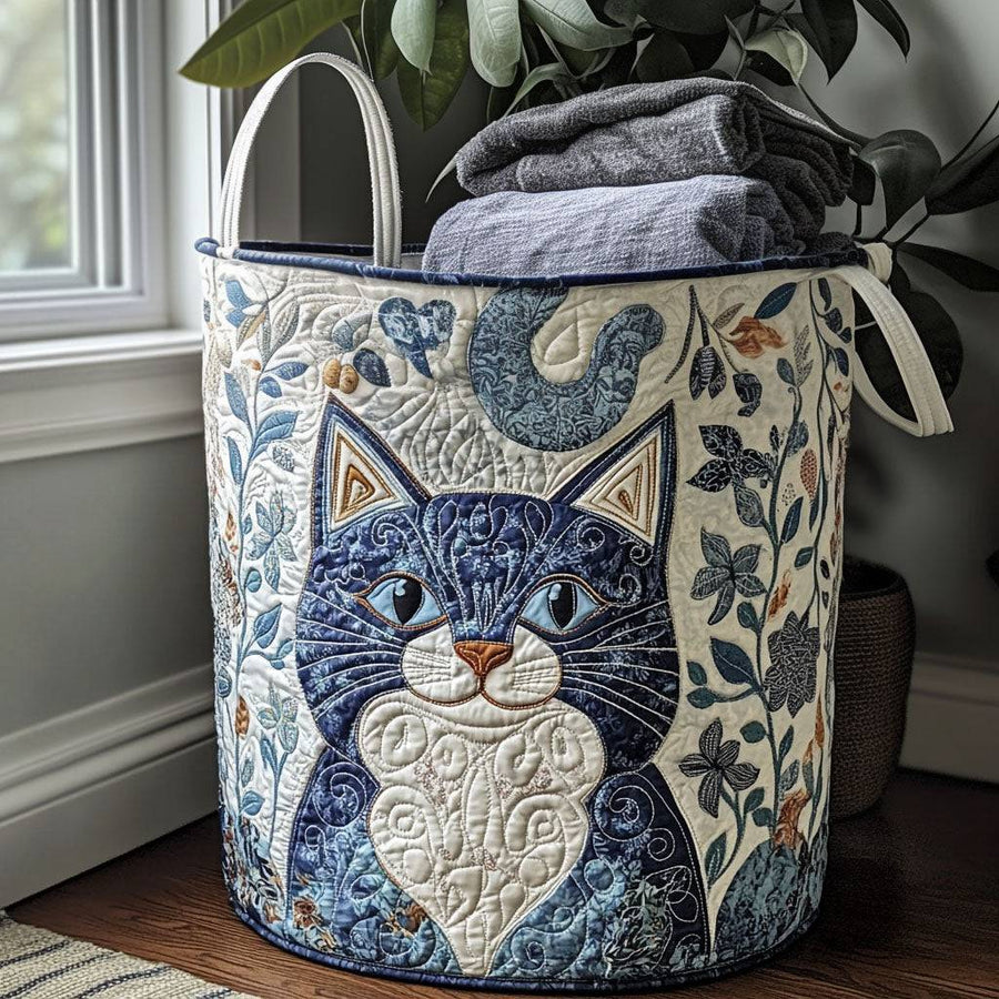 Velvet paws quilted laundry basket by THE WHITMORE FAMILY, soft fabric with a cozy quilted pattern, designed for cat-themed home decor.