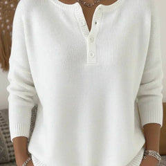 White Henley button-up knit sweater for women by THE WHITMORE FAMILY, featuring a classic collar and cozy knit texture.