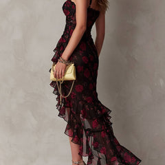 Floral Lane dress by THE WHITMORE FAMILY featuring ruched hem and vibrant floral pattern, perfect for spring and summer wear.