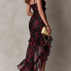 Floral Lane dress by THE WHITMORE FAMILY featuring ruched hem and vibrant floral print, perfect for spring and summer occasions.