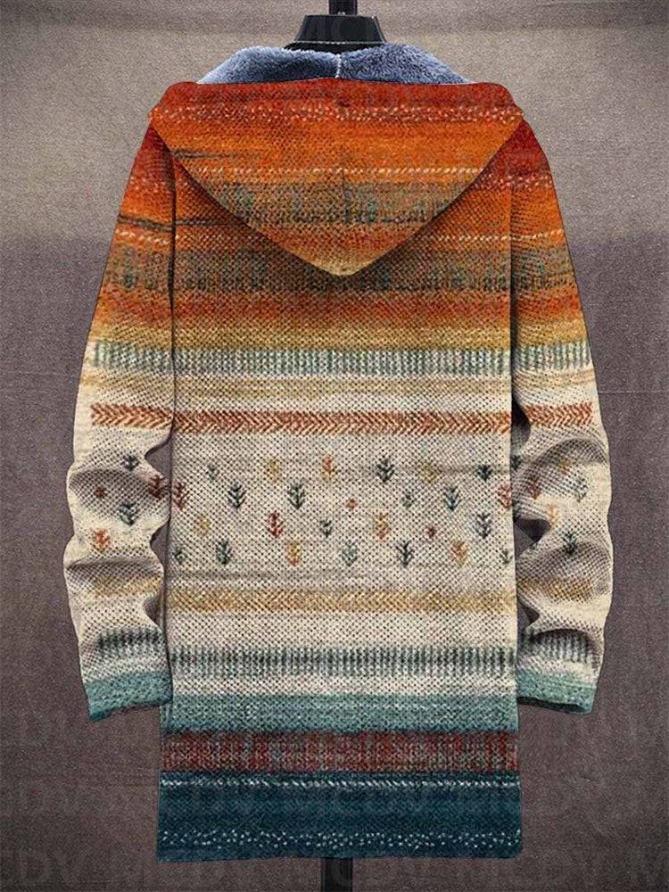 Luxurious artistic hooded cardigan coat by THE WHITMORE FAMILY featuring intricate design and cozy fabric in a stylish silhouette.