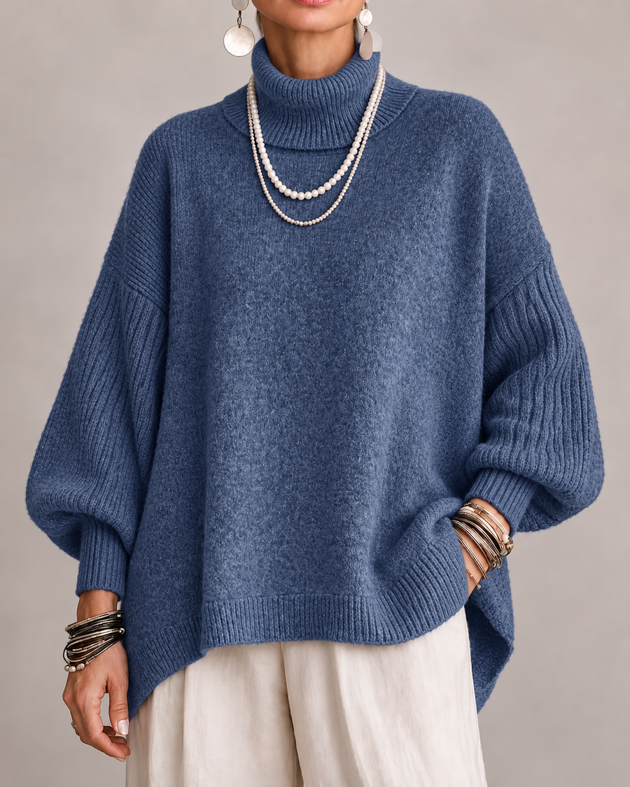 Kathleen elegant turtleneck sweater by THE WHITMORE FAMILY, featuring a cozy fit and classic design in soft fabric.