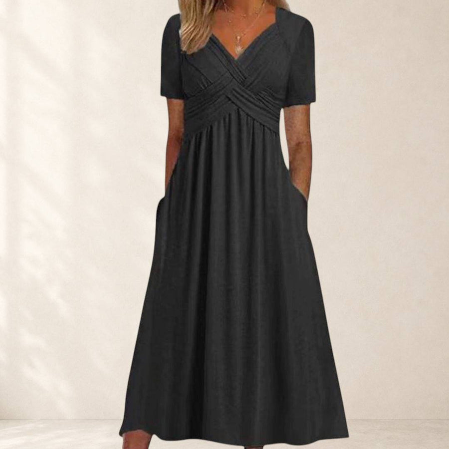 Amanda flattering dress by THE WHITMORE FAMILY, shown in a stylish fit with elegant fabric and a flattering silhouette.