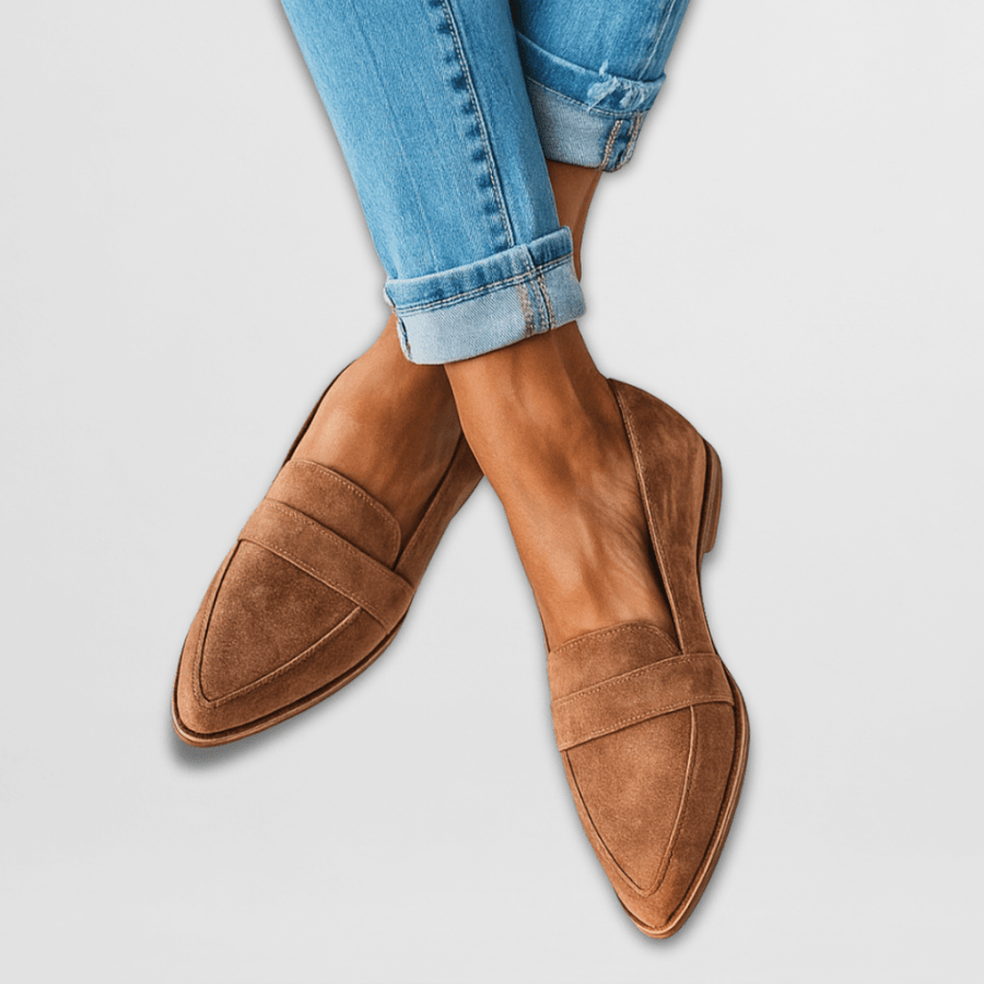 Soft women's Adriana loafers by THE WHITMORE FAMILY, showcasing beige moccasin-style calzature with stitching and slip-on design.
