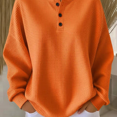 Cosy waffle henley sweatshirt for women by THE WHITMORE FAMILY, featuring a soft, textured fabric and classic henley neckline.
