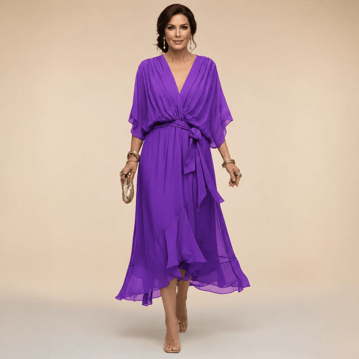 Mona V-neck dress by THE WHITMORE FAMILY featuring a stylish V-neckline and elegant silhouette.
