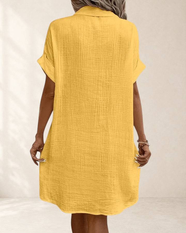 Gianelleza™ Sophisticated Midi Dress by THE WHITMORE FAMILY, featuring a sleek design, sleeveless cut, and elegant midi length.