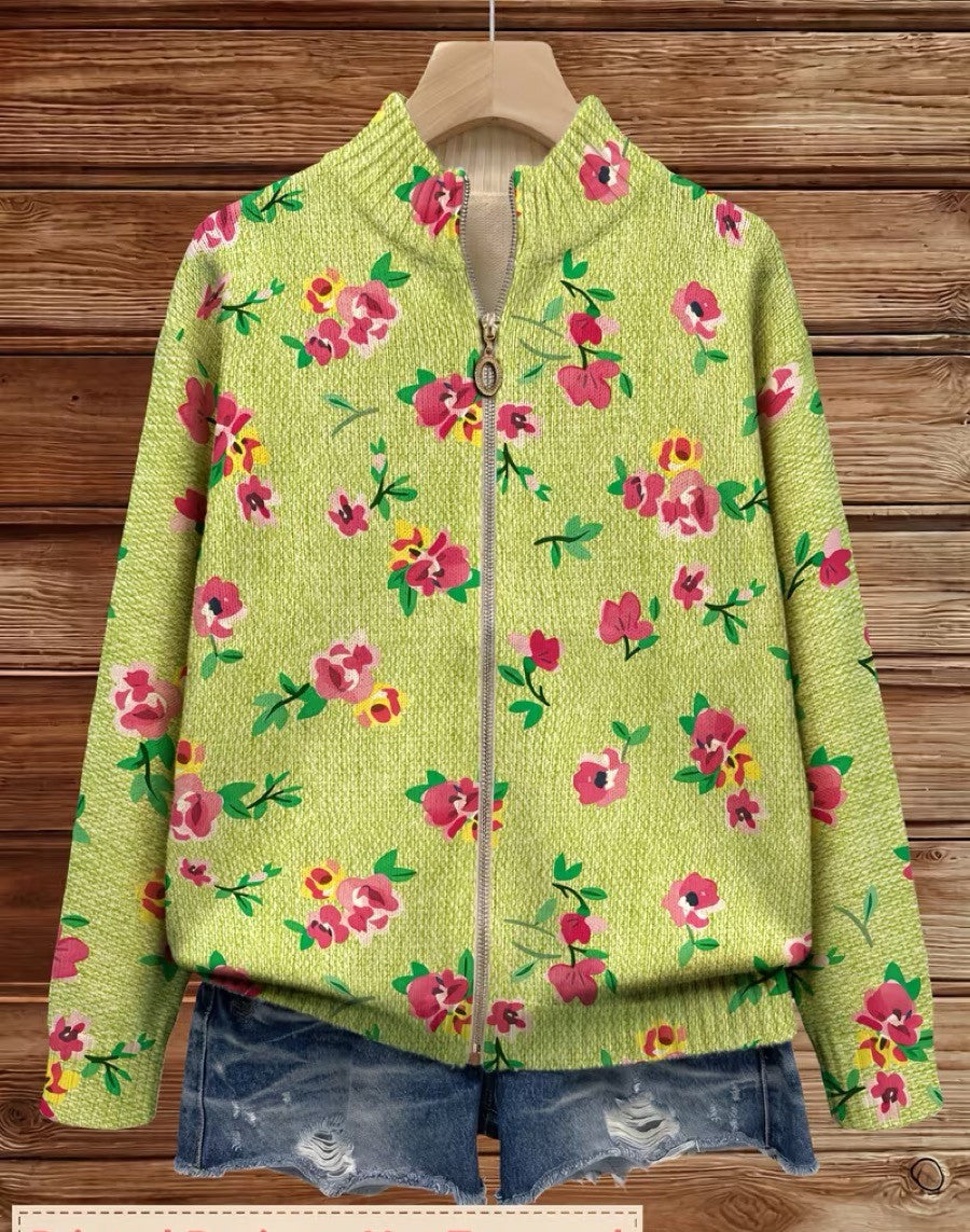 Pink floral lime zip cardigan named Margot by THE WHITMORE FAMILY, featuring a vibrant floral pattern and a front zip closure.