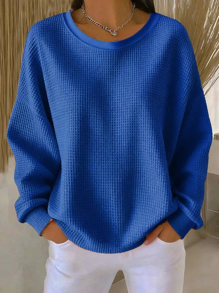 Women’s classic sweater jumper by THE WHITMORE FAMILY, featuring a cozy knit design in neutral tones, perfect for casual wear.