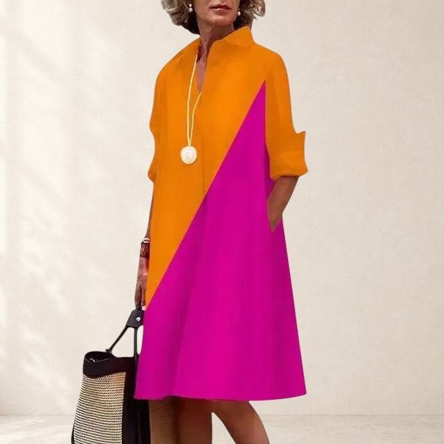 Elegant Paige™ dress by THE WHITMORE FAMILY featuring a stylish design with practical pockets, perfect for versatile wear.