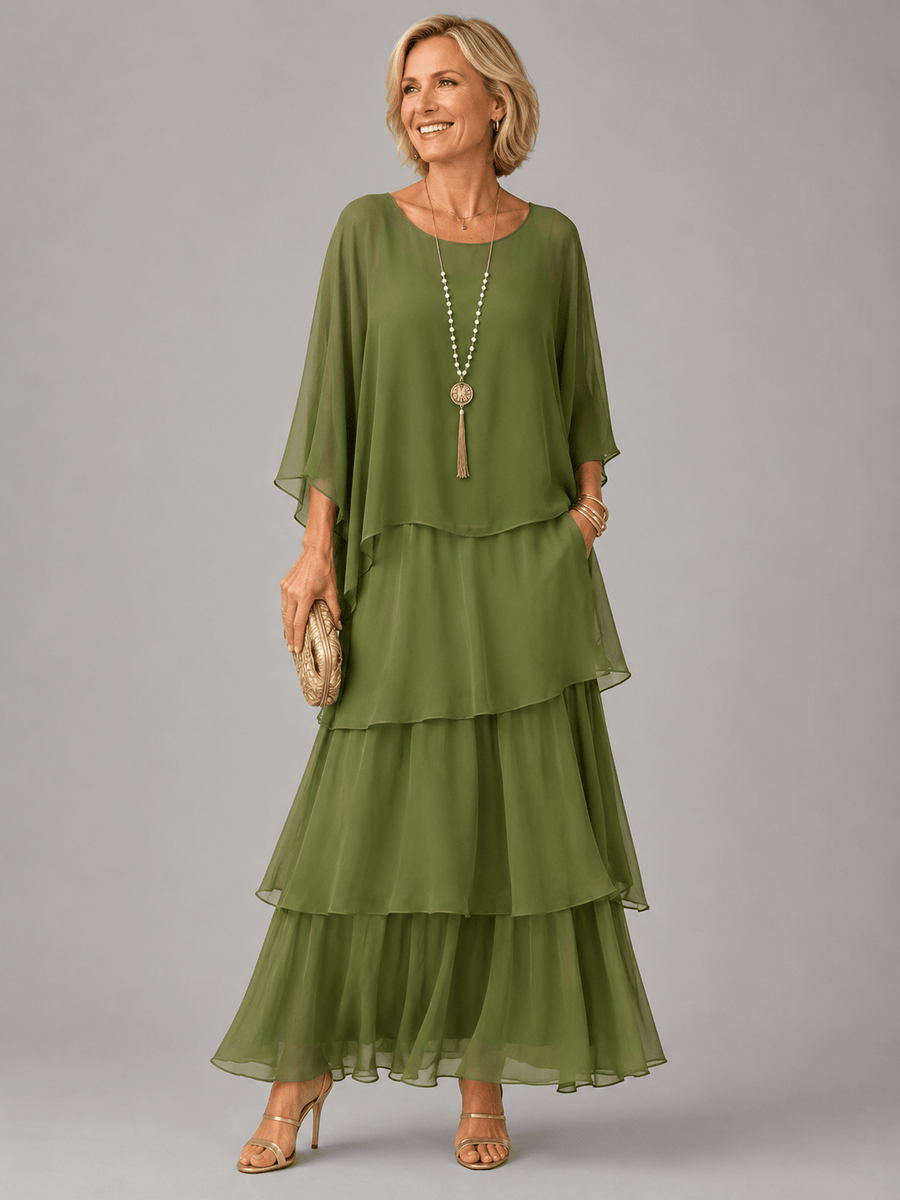 Chloe™ elegant flowing maxi dress by THE WHITMORE FAMILY, featuring lightweight fabric and a graceful silhouette.
