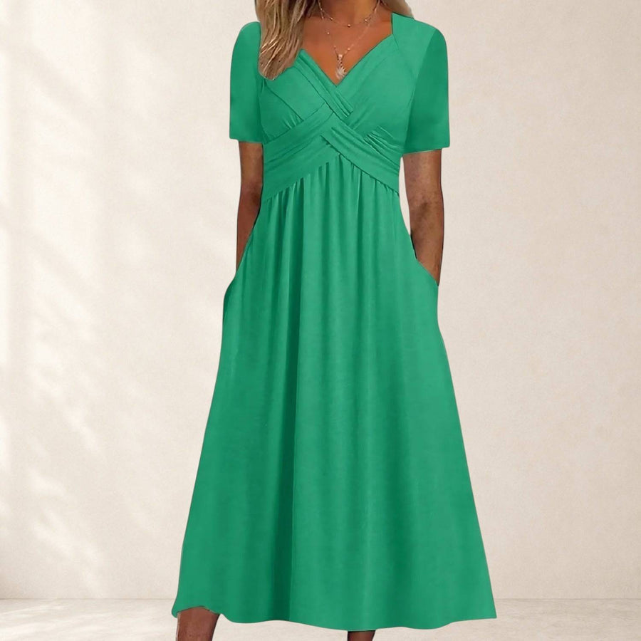 Viola™ midi dress with tummy control by THE WHITMORE FAMILY, featuring a fitted silhouette and elegant design.