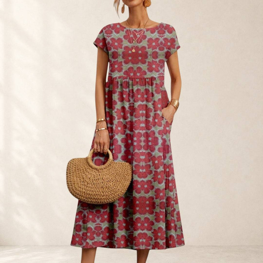 Valencia™ Chic Floral Dress by THE WHITMORE FAMILY displayed with vibrant floral pattern and elegant fit.