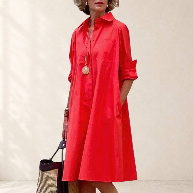 Elegant Paige™ dress by THE WHITMORE FAMILY featuring a stylish design with practical pockets, perfect for casual or semi-formal wear.