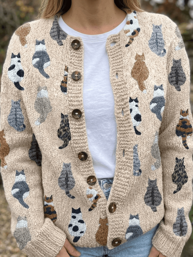 Charlotte™ Cozy Cat Print Cardigan by THE WHITMORE FAMILY featuring a soft knit fabric and charming feline patterns.