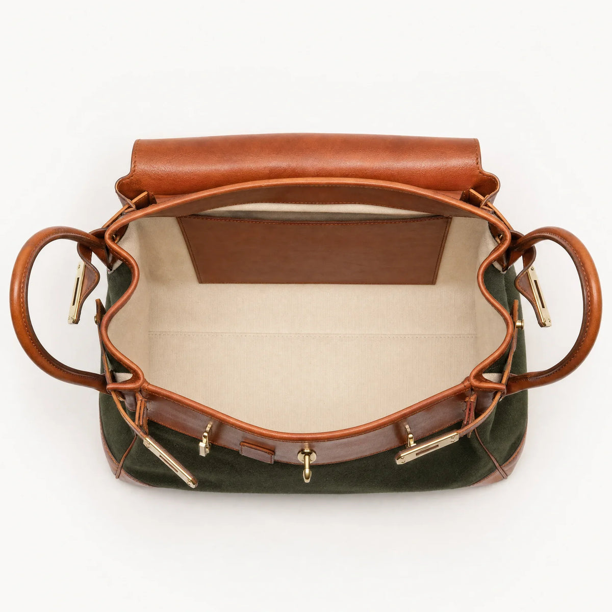 Green Eleanor Weekender bag by THE WHITMORE FAMILY, showing the spacious fabric tote with leather handles and sturdy design.