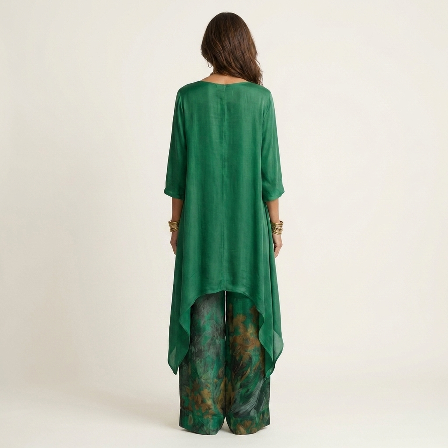 Cotton-silk two-piece set featuring an asymmetric tunic from THE WHITMORE FAMILY Cariola collection, displayed on a hanger.