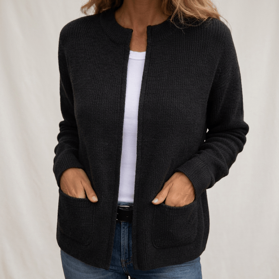 Annika cozy cardigan with deep pockets from THE WHITMORE FAMILY, featuring a soft knit texture and relaxed fit.