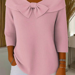 Women’s sweater with bow and round neckline by THE WHITMORE FAMILY, featuring a cozy knit fabric and stylish design.