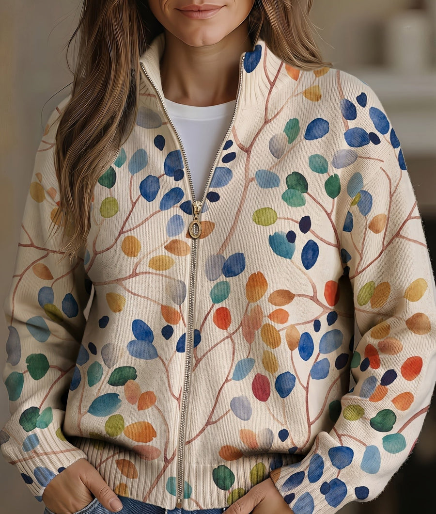 Delphine botanical leaf print zip cardigan by THE WHITMORE FAMILY, featuring a cozy knit with green leaf pattern and front zipper.