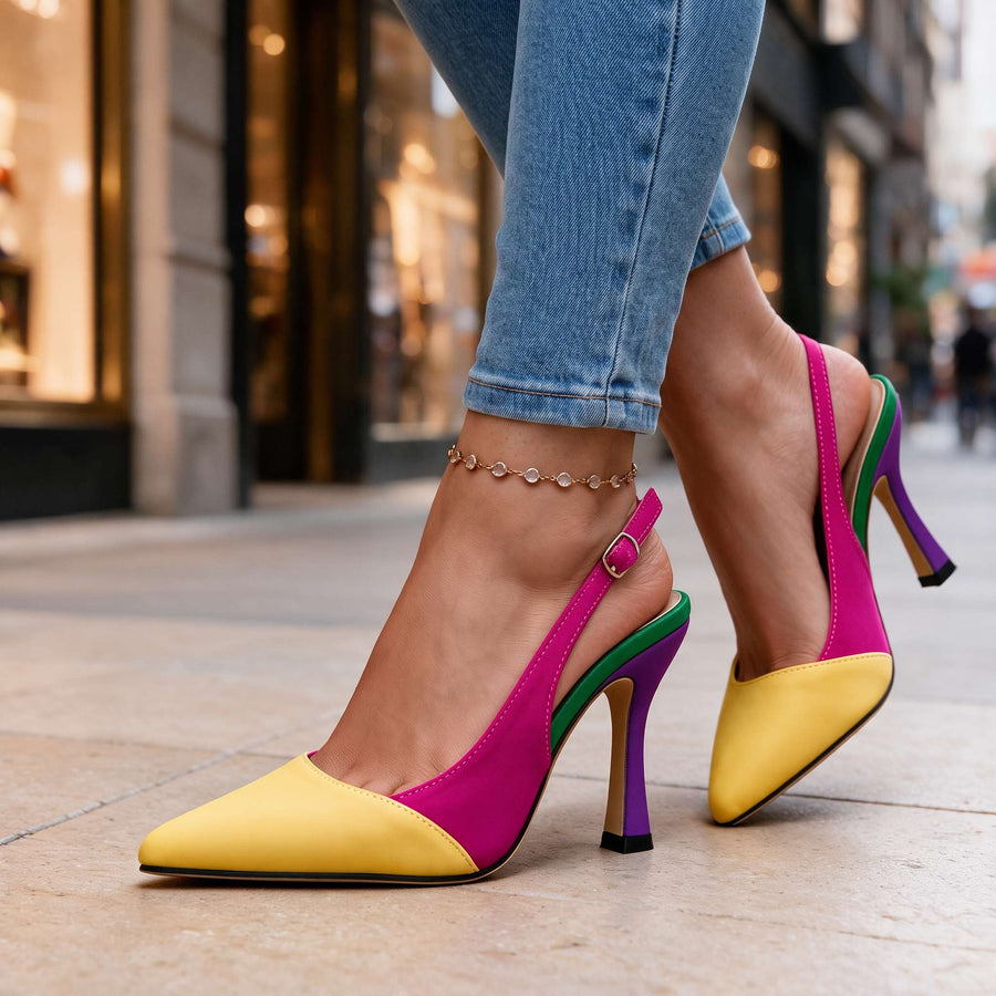 Women's Layla slingback heels by THE WHITMORE FAMILY, featuring elegant design and stylish details, worn with jeans in the image.