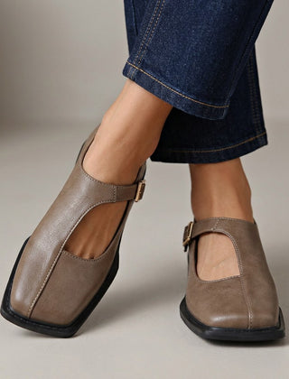 Rosalie Comfort Leather Flats by THE WHITMORE FAMILY, showcasing elegant, soft leather footwear with a sleek, comfortable design.