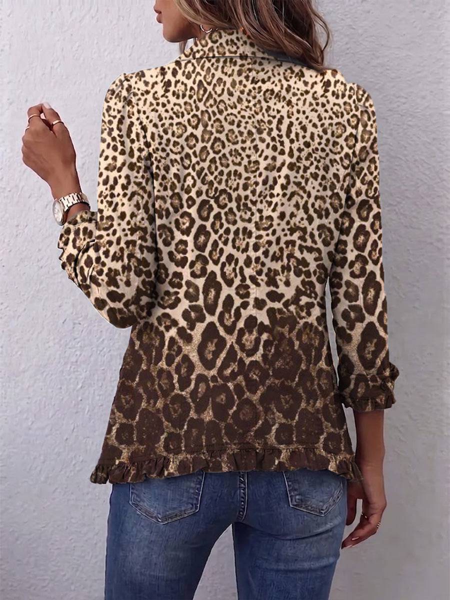Leopard print Navara™ ruffled jacket by THE WHITMORE FAMILY, showcasing ruffled edges and stylish animal print fabric.
