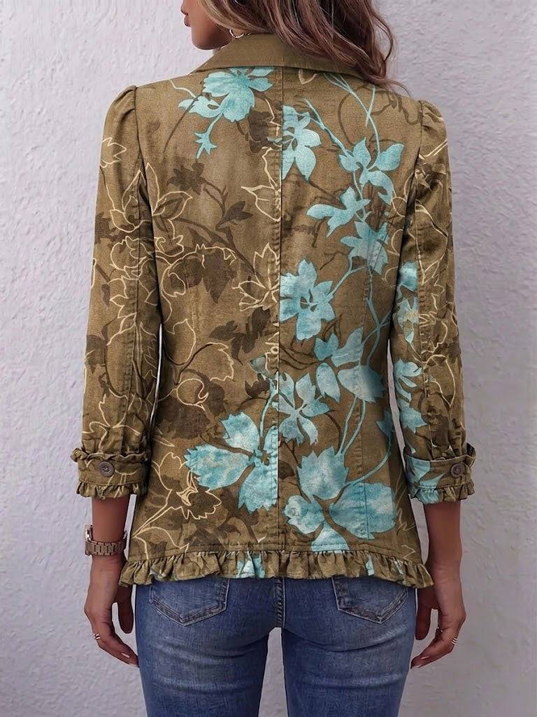 Sundara™ Boho Gradient Vintage Floral Ruffle Jacket by THE WHITMORE FAMILY, featuring colorful floral patterns and ruffled details.