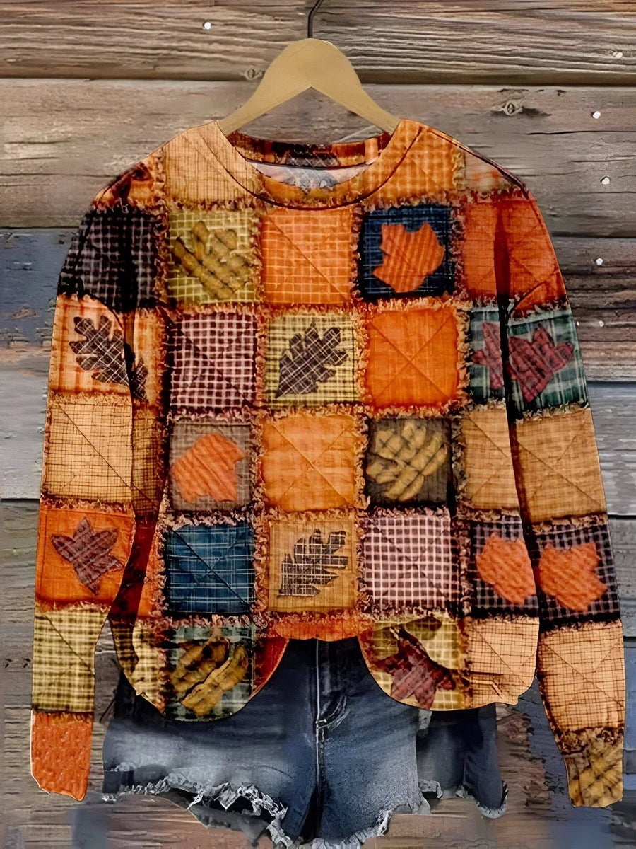 Mireille knit sweater by THE WHITMORE FAMILY, featuring a cozy, textured knit in a stylish, versatile design.