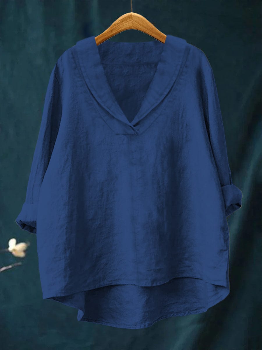 Samantha in the Elowen relaxed V-neck blouse by THE WHITMORE FAMILY, showing the soft fabric and casual fit of the stylish blouse.