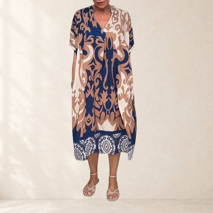Comfortable Carvyna dress by THE WHITMORE FAMILY, featuring a relaxed fit in soft, breathable fabric, ideal for casual wear.