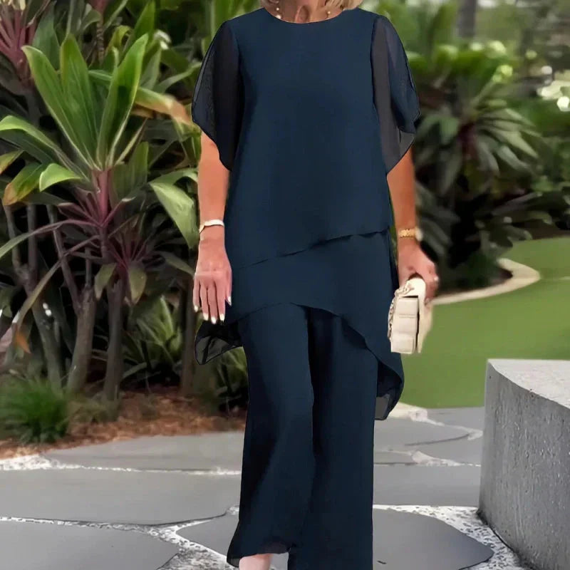 Beverly™ elegant asymmetrical two-piece set by THE WHITMORE FAMILY, featuring a stylish, modern design and coordinated fashion look.