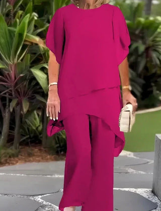 Beverly™ elegant asymmetrical two-piece set by THE WHITMORE FAMILY, featuring stylish design and modern silhouette.