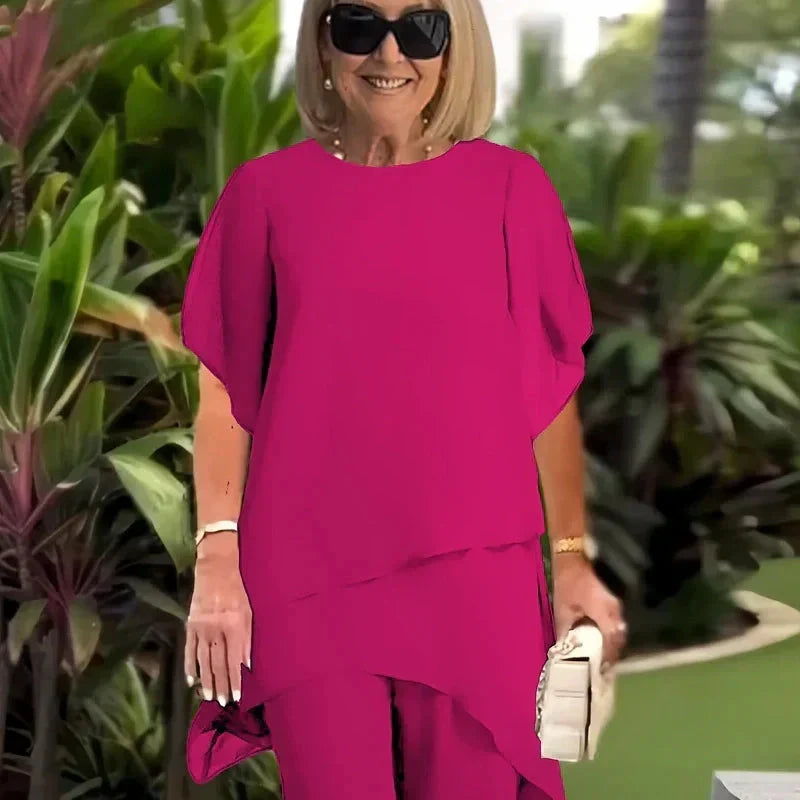 Elegant Beverly™ asymmetrical two-piece set by THE WHITMORE FAMILY, featuring stylish design and flattering fit in a fashionable ensemble.