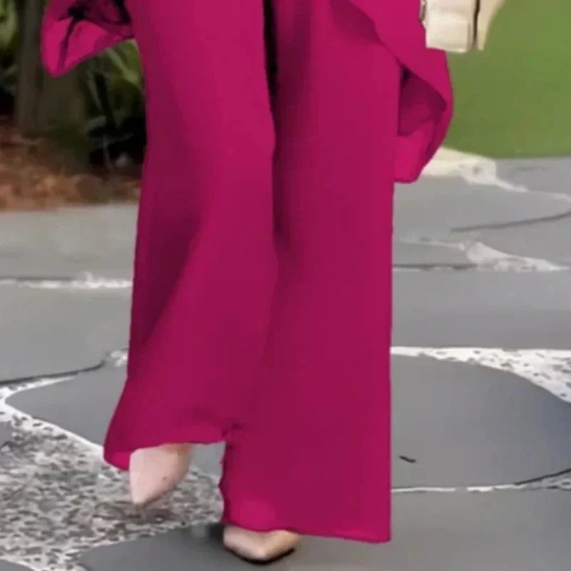 Elegant Beverly™ asymmetrical two-piece set by THE WHITMORE FAMILY, featuring stylish design and modern fit in a high-quality fabric.