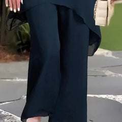 Beverly™ elegant asymmetrical two-piece set by THE WHITMORE FAMILY, featuring stylish design and sophisticated fabric details.