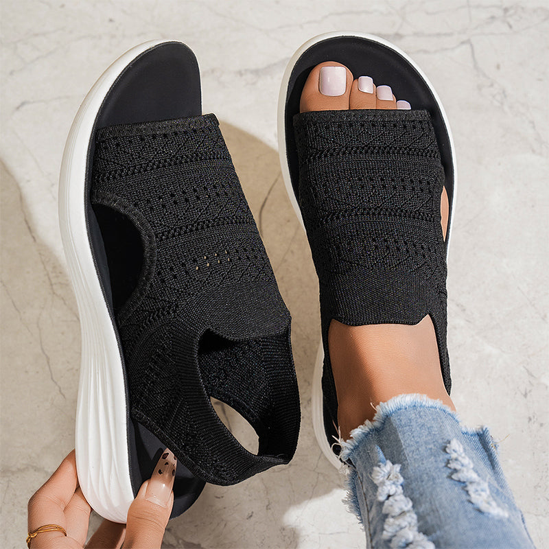 Zina breathable knit platform sandals by THE WHITMORE FAMILY, showcasing stylish open-toe design and chunky sole on a neutral background.